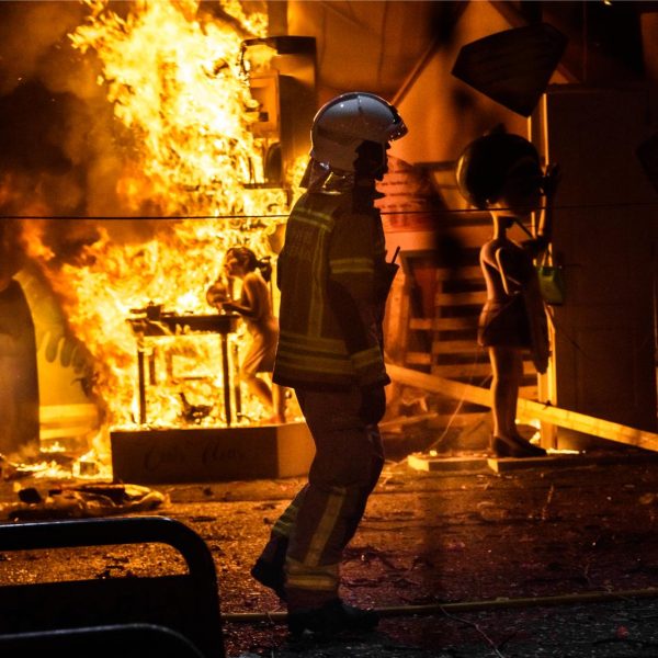 silhouette-of-fireman-trying-to-control-a-fire-in-2023-11-27-05-01-40-utc